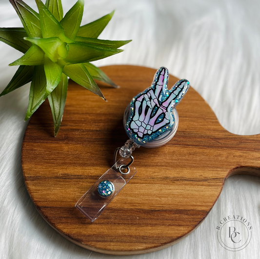 Skelly Peace Sign Badge Reel